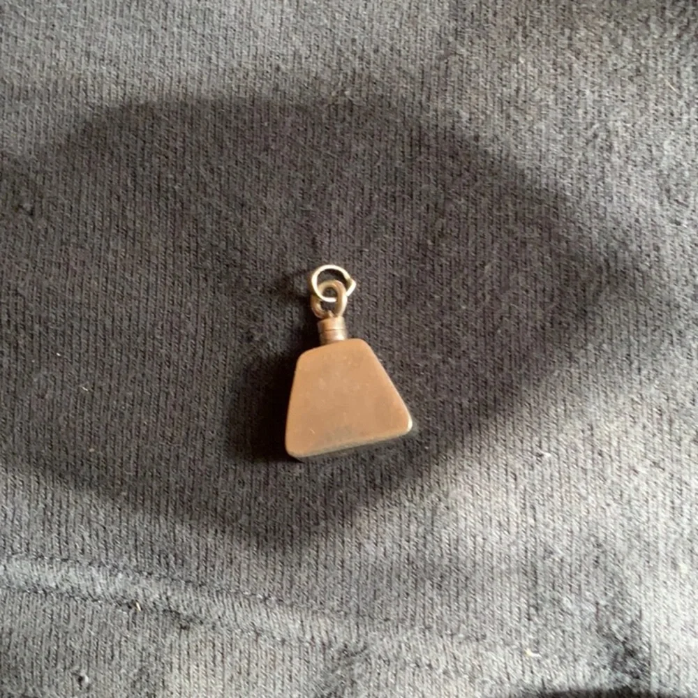 Silver charm or pendant